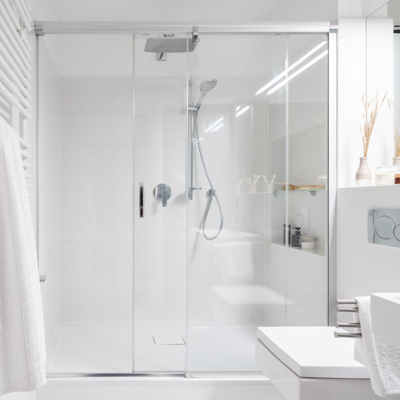 Dual Shower Heads in a Spacious Enclosure